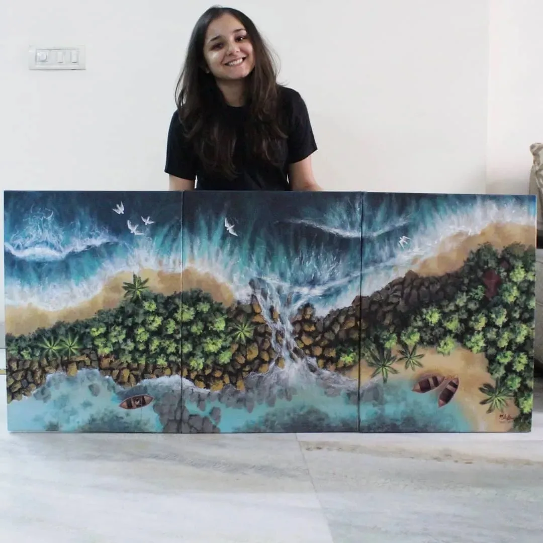 Nikita Chhabra with one of her paintings