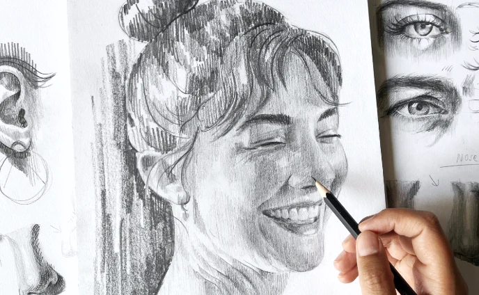 Portrait sketch with studies of eyes and a drawing hand