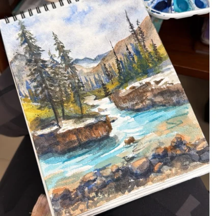 Learner artwork: a mountain landscape in a watercolour journal